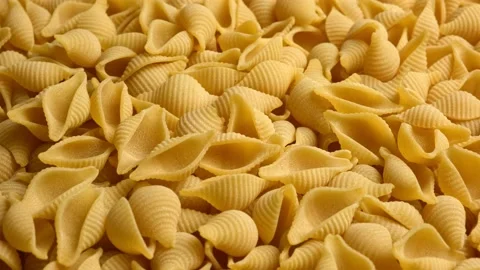 Conchiglie, Shells or Seashells Pasta Wallpaper. Conchigliette Raw Macaroni Stock Footage 220326060