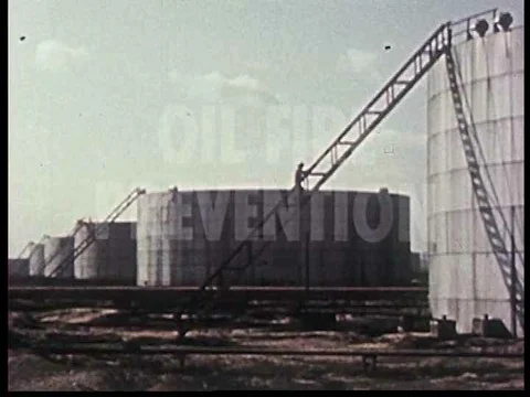 Concluding oil fire prevention tactics, and a fire eater show. Stock Footage 75789894