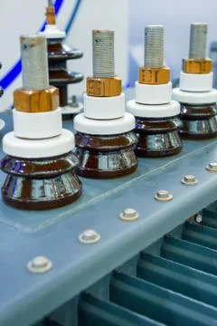 Conclusions high voltage electrical transformer. Power contacts and ceramic Stock Photos