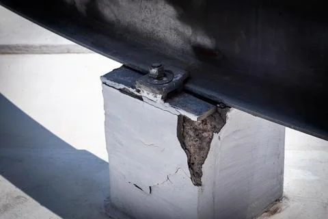 Concreat crack at base of BMU for mantenance machine Stock Photos