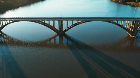Concrete Arch Bridge Casting Geometric Shadows Across Ozark Water Stock Footage 344286613