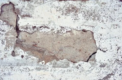 Concrete background with cracks and irregularities. Abstract background Stock Photos