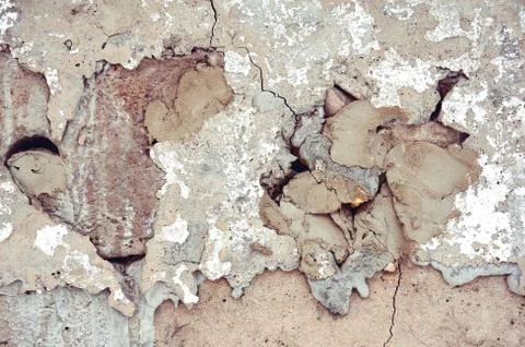 Concrete background with cracks and irregularities. Abstract background Stock Photos