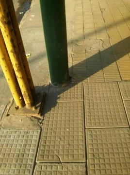 Concrete background with different elements in street in daylight Stock Photos