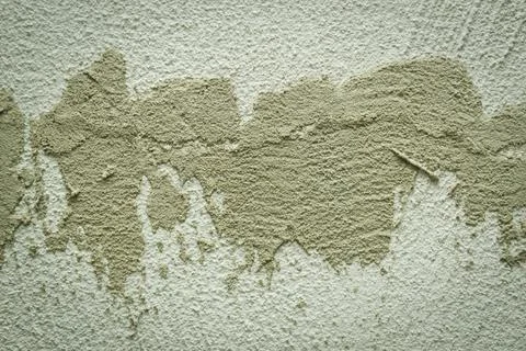 Concrete background. Plaster on the wall. Embossed textured surface. Stock Photos