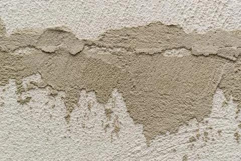Concrete background. Plaster on the wall. Embossed textured surface. Stock Photos