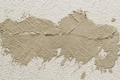 Concrete background. Plaster on the wall. Embossed textured surface. Stock Photos