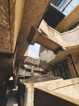 Concrete beam structure creates geometric pattern at old millfun. brutalist.. Stock Photos