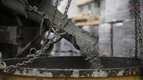 Concrete Being Poured into Construction Formwork Bucket Stock Footage 297497545