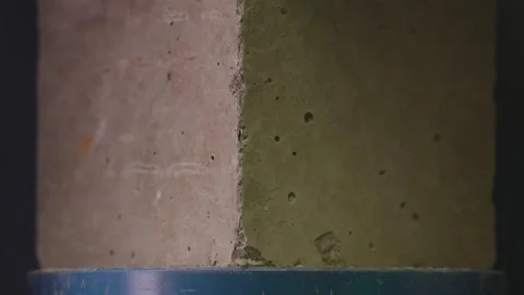 Concrete block breaks under high pressure . Compressive strength test Stock Footage 153047155