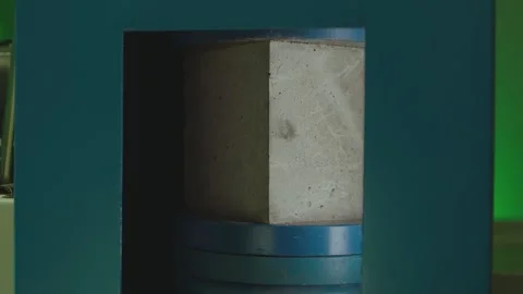 Concrete block breaks under high pressure . Compressive strength test Stock Footage 153051238