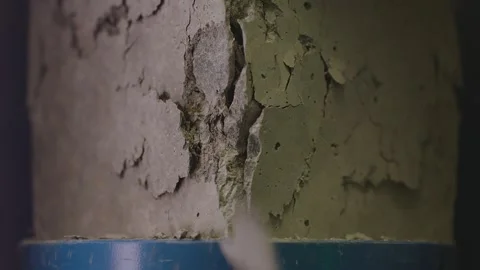 Concrete block breaks under high pressure . Compressive strength test Stock Footage 153052542