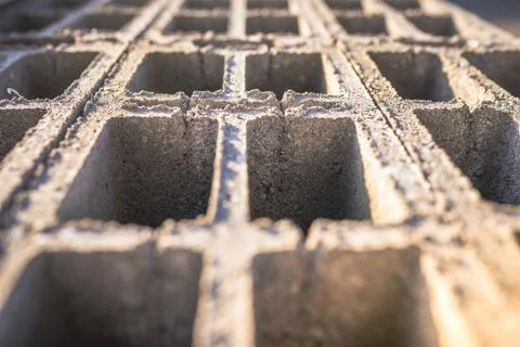 Concrete block bricks in stack for wall construction. Concrete block, cinder Stock Photos