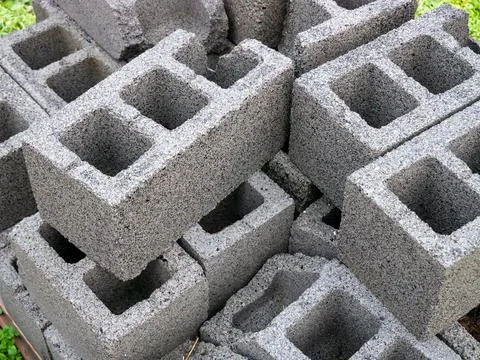Concrete block bricks in stack for wall construction Stock Photos