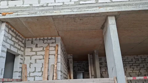 Concrete Block House Under Construction with Reinforced Concrete Frame Stock Footage 346019175