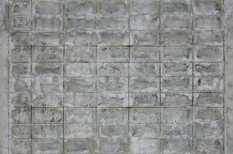 Concrete block wall seamless background and texture. Stock Photos