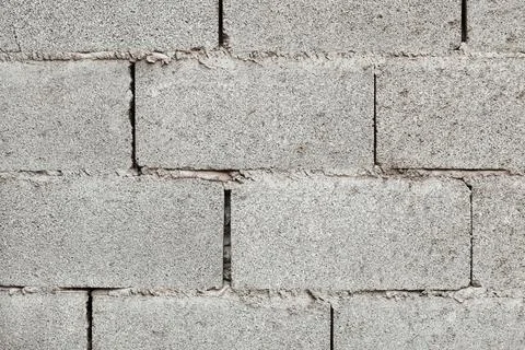 Concrete block wall texture background, gray masonry construction pattern Foto stock