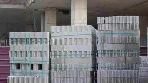 Concrete blocks stacked on construction site outdoor closeup Stock Photos