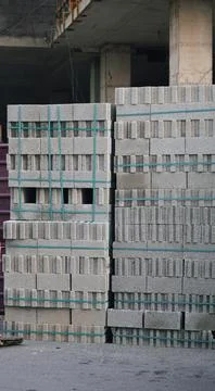 Concrete blocks stacked on construction site outdoor closeup Stock Photos