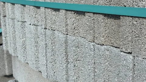 Concrete blocks stacked with uneven surfaces, suitable for construction bac.. Stock Footage 330965283
