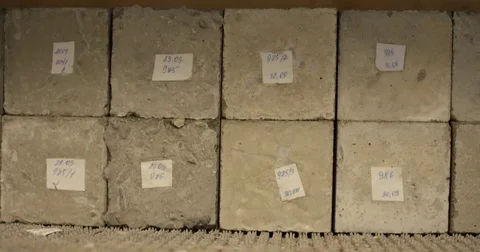 Concrete brick pressure test. Cracks covering the brick under pressure. Slow Video stock 82246745