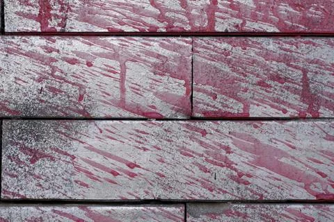 Concrete bricks with a splash of red colour Stock Photos