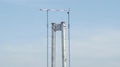 Concrete bridge pillars under construction whit crane Video stock 149851698