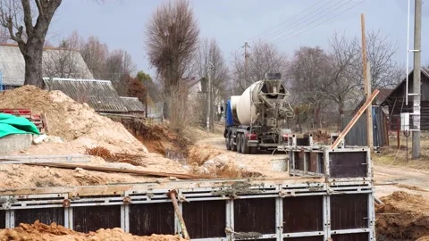 Concrete casting pump. Construction machinery works on building of modern house Stock Footage 194003209