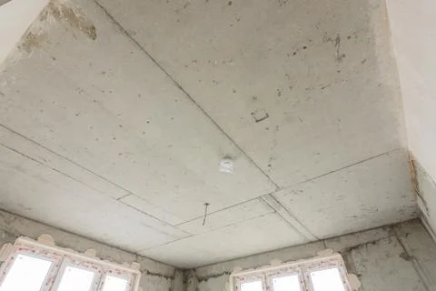 Concrete ceiling of a monolithic house close-up in a new building Stock Photos