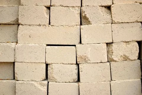 Concrete Cement Block bricks in stack for wall construction. Dirty Old Textur Stock Photos