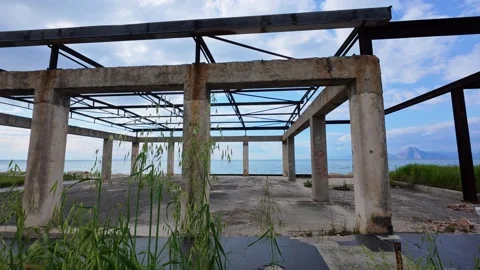 Concrete Columns and Rusty Beams Remain from Hurricane Damage Stock Footage 306313785