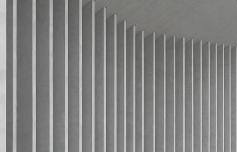 Concrete columns forming repeating vertical pattern in minimalist architectur Фото