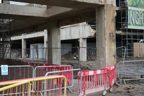 Concrete Construction Site With Scaffolding And Barriers, Nottingham, England. Stock Photos