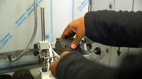 Concrete core sample bring testing in a civil engineering lab to check its.. Stock Footage 329210614