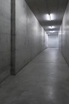 Concrete corridor in building Stock Photos