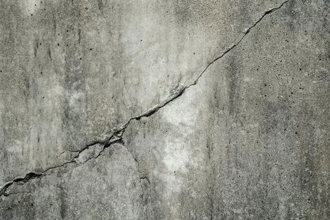 Concrete crack texture background texture. Grey crack wall Foto stock