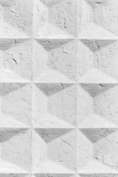 Concrete cracked wall with rhombuses pattern Stock Photos