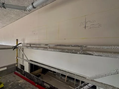 Concrete cutting work in progress on building site Stock Photos