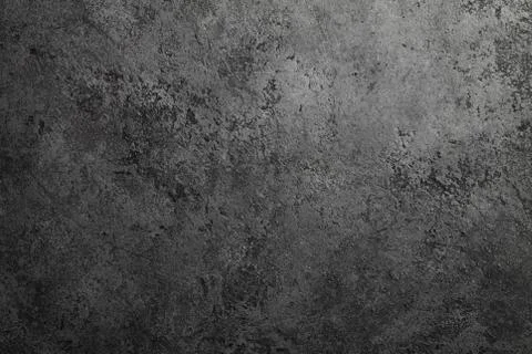 Concrete dark gray background with scuffs and black splashes. Textured wall t Stock Photos