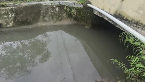 A concrete drainage ditch Stock Footage 336675686