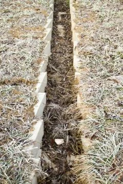 Concrete drainage ditch Stock Photos