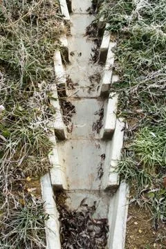 Concrete drainage ditch Stock Photos