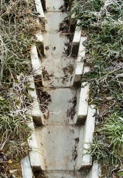 Concrete drainage ditch Stock Photos