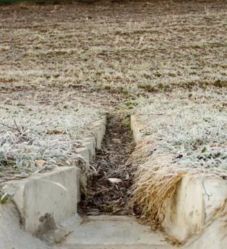 Concrete drainage ditch Stock Photos