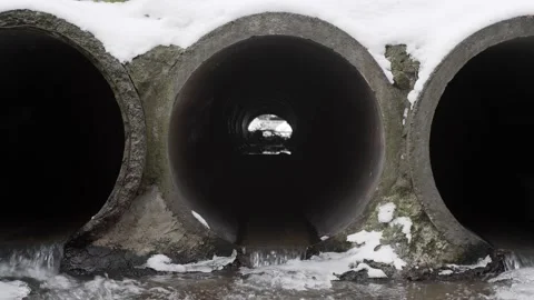Concrete drainage pipes that remove melted snow and ice. Stock Footage 149239918
