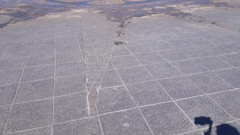 Concrete floor of a fountain in function with water jets on the boardwalk 스톡 동영상 127636876