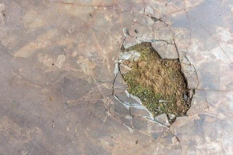 Concrete floor surface with cracks. Stock Photos