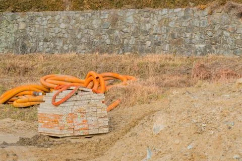 Concrete forms and flexible pipe Stock Photos