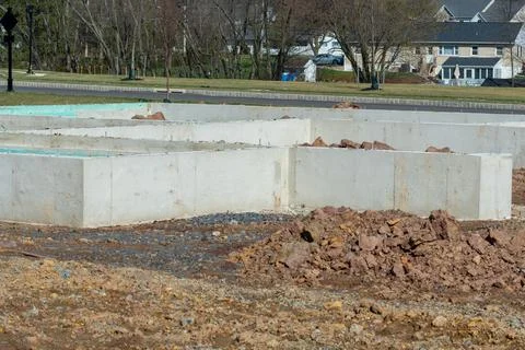 Concrete foundation for house Stock Photos