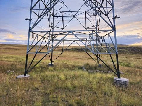 Concrete foundations for supporting high-voltage towers in high Andean meadow Stock Photos